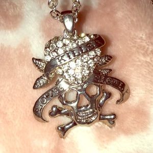 Love kills slowly heart and skull diamond necklace